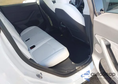 2022 Tesla Model Y из США, поврежденный, VIN 7SAYGDEE1NF554234